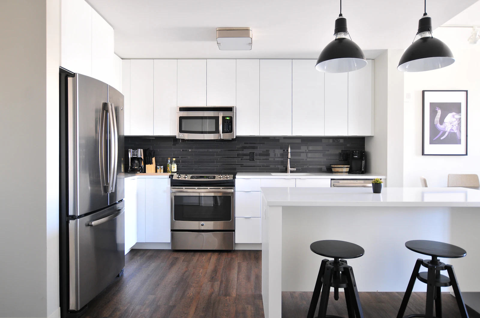 A clean apartment kitchen with clear counters